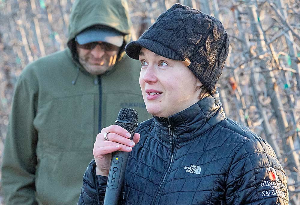 Suzanne Bishop, research and technology manager for Allan Bros. discusses crop management in multileader grafted trees. (TJ Mullinax/Good Fruit Grower)