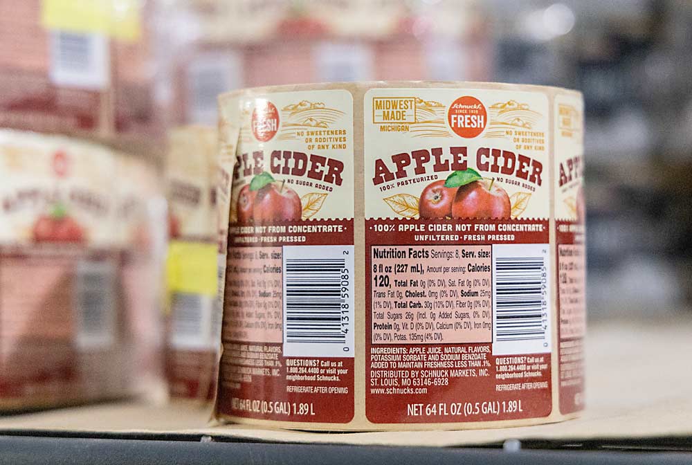 Product labels at the Riveridge Cider Co.’s production facility, which can press up to 50,000 gallons of sweet cider per day. (Matt Milkovich/Good Fruit Grower)
