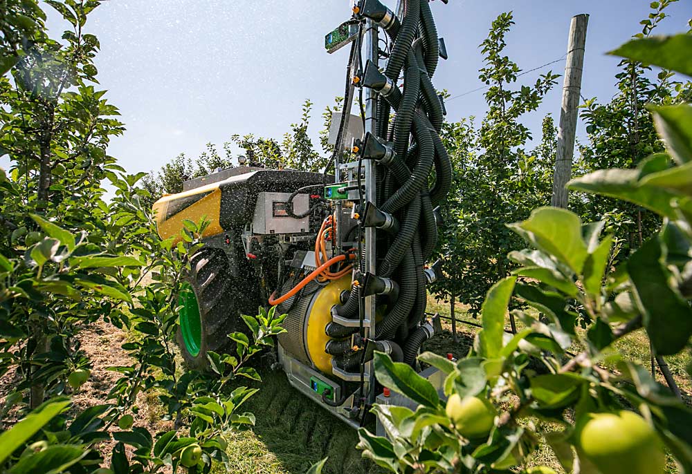 A rear view of the AgBot autonomous sprayer.  Each nozzle is controlled by sensors that evaluate the density of the tree canopy.  (TJ Mullinax/Good Fruit Grower)