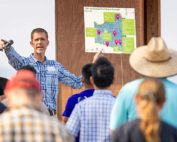 During a July field day, Steve Mantle, owner of innov8.ag, shares a map of all the sensors and other technology packed into a Grandview, Washington, Honeycrisp block that’s hosting the Smart Orchard project. The effort is backed by the Washington Tree Fruit Research Commission and Washington State University. (TJ Mullinax/Good Fruit Grower)