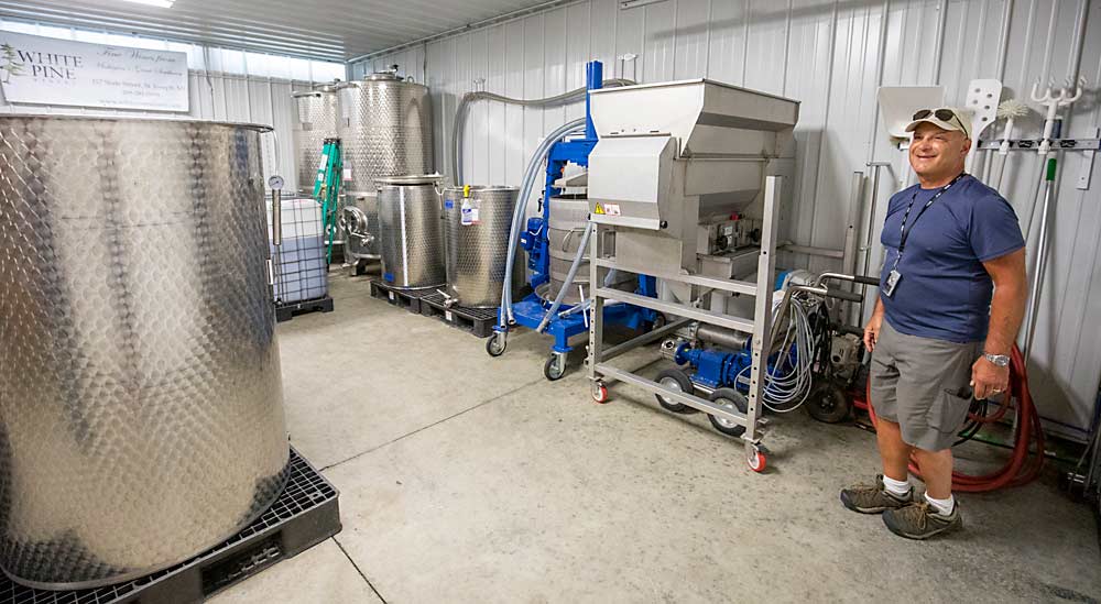 It took Miller a few years to buy his own crusher and other winemaking equipment. In those early days, he got help from another winery. (TJ Mullinax/Good Fruit Grower)