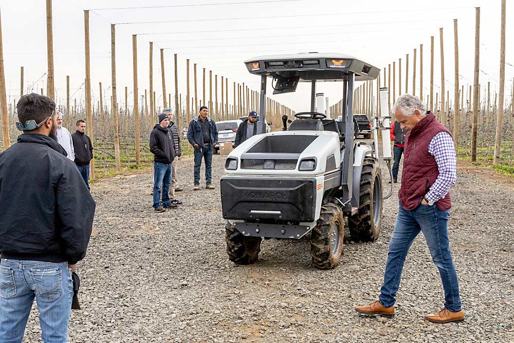 Monarch Tractor, a California-based manufacturer, brought a pilot version of its electric and autonomous tractor for demonstrations with the tree fruit and wine grape industries in Washington in April. The first production models are expected to be delivered to customers later this year, according to marketing director Kelsey Ducker. (Kate Prengaman/Good Fruit Grower)