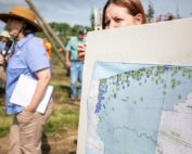 Margaret Kelly, left, shows an updated map showing 2019 trap findings of European cherry fruit fly in New York including the commercial cherry quarantine areas of Niagara, Erie and portions of Orleans counties on July 18, 2019. (TJ Mullinax/Good Fruit Grower)