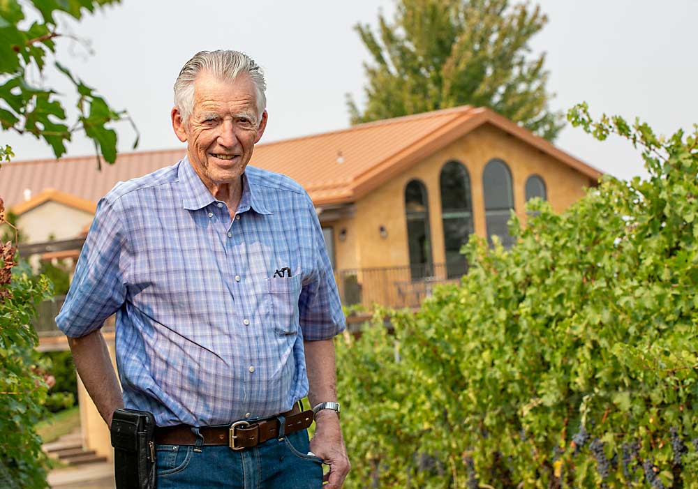 Walla Walla’s founding grape grower, Norm McKibben, in a Cabernet Sauvignon block at Pepper Bridge Winery in September. These vines were his first successful vineyard, but McKibben predicts that many of the hundreds of acres he planted around the region will be slated for replanting over the next 10 years onto phylloxera-resistant rootstocks, which he calls an opportunity for the next generation of wine grape growers to take the region’s viticulture to its next level. (TJ Mullinax/Good Fruit Grower)