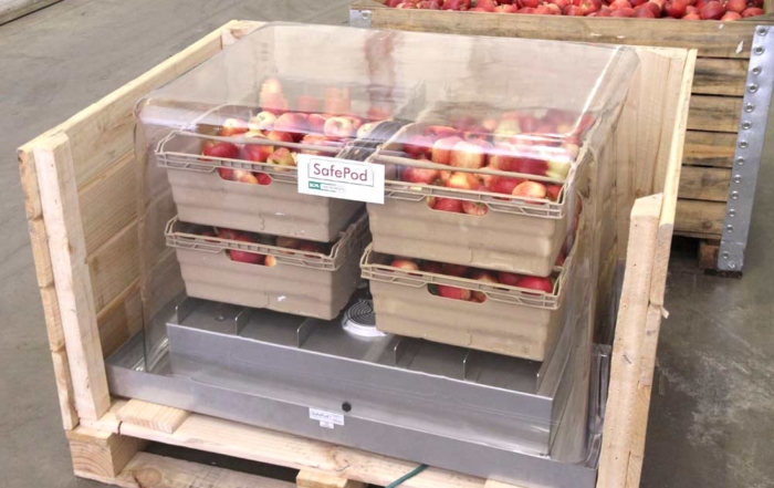 Apples sit in a SafePod in a storeroom in Kent, United Kingdom. The SafePod monitors the fruit’s respiration to assess how it is tolerating low-oxygen storage in order to help warehouses optimize storage conditions.(Courtesy Storage Control Systems, Inc.)