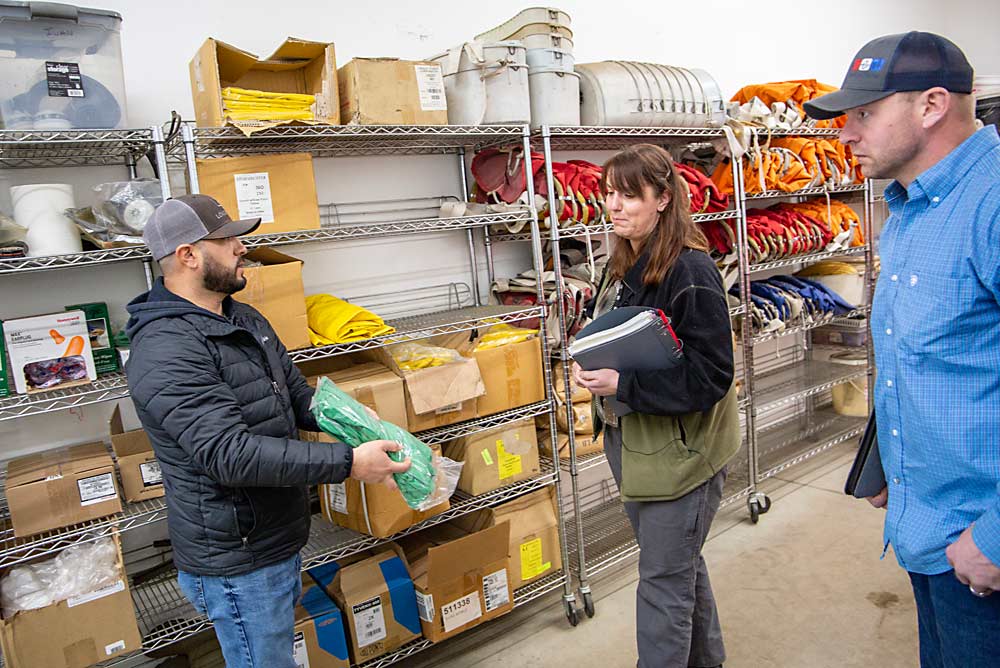 Personal protective equipment must be in good condition, include an array of sizes and be stored separately from chemicals. (Ross Courtney/Good Fruit Grower)