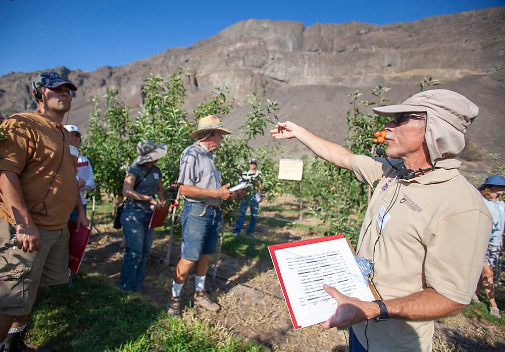 Washington State University sustainable agriculture specialist David Granatstein speaks to attendees of a 2013 WSU field day at Sunrise Research Orchard near Rock Island, Washington. (TJ Mullinax/Good Fruit Grower)