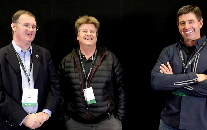 From left, Jason Matson, Tye Fleming and Scott Crawford spoke about how to reduce risk through horticultural techniques during a panel at the Washington State Tree Fruit Association’s annual meeting in December in Yakima, Washington. (TJ Mullinax/Good Fruit Grower