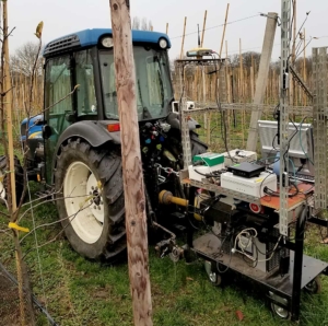 The dream of automated tractors nears reality, with add-on technology such as this equipment that can turn a regular tractor into a robot, as Washington growers and industry leaders saw on a recent trip to the Netherlands. A new approach to the technology roadmap aims to outline the need for such innovations to guide entrepreneurs and growers into the future of orchard management.(Courtesy Washington State University)