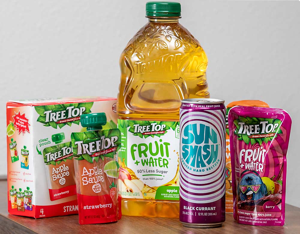 Tree Top, the Selah, Washington, food processor, is launching new products aimed at keeping up with changing consumer preferences. Among them are SunSmash hard seltzer and Fruit + Water low-sugar juice. The cooperative also intends to expand and diversify its pouch applesauce line. (TJ Mullinax/Good Fruit Grower)