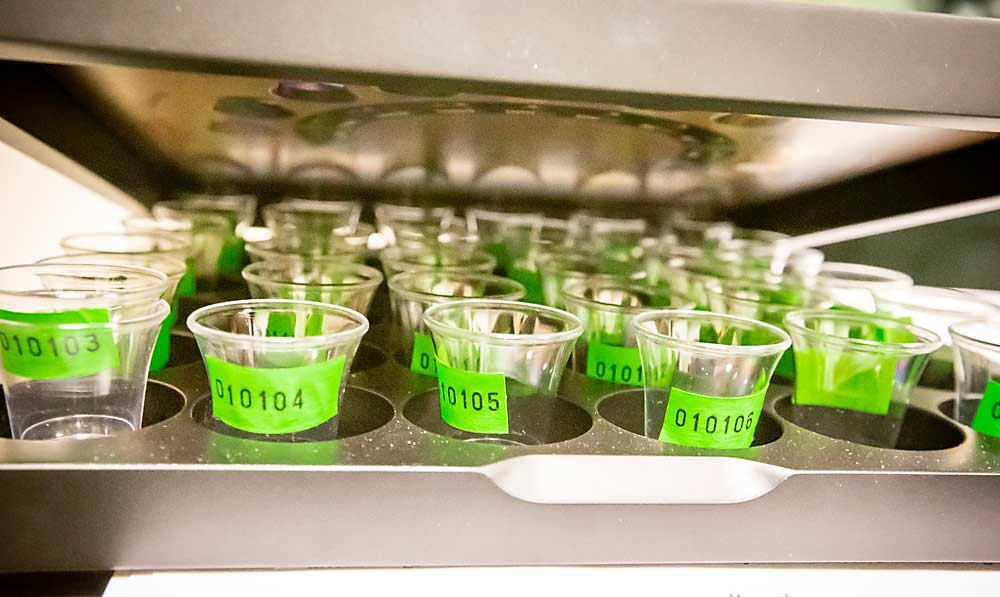 A laboratory machine loaded with vials at the U.S. Department of Agriculture’s Western Human Nutrition Research Center in Davis, California, where sweet cherry health research was conducted on behalf of the Northwest industry. Decades of health research is now bearing fruit for the marketing efforts of multiple crops.(Courtesy James Michael/Northwest Cherry Growers)