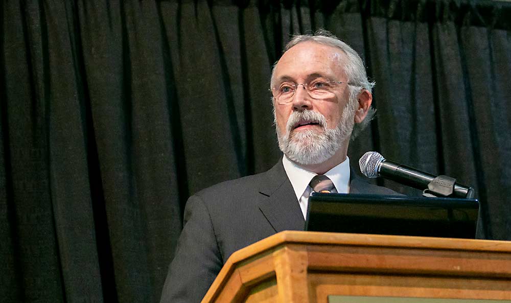 U.S. Rep. Dan Newhouse, R-Wash., co-authored the Farm Workforce Modernization Act, which recently passed with bipartisan support in the House of Representatives. For years it’s been a priority for the grower-turned-congressman, seen here speaking at the Washington State Tree Fruit Association Annual Meeting and NW Hort Expo in December 2014, shortly after his election to federal office. (TJ Mullinax/Good Fruit Grower)
