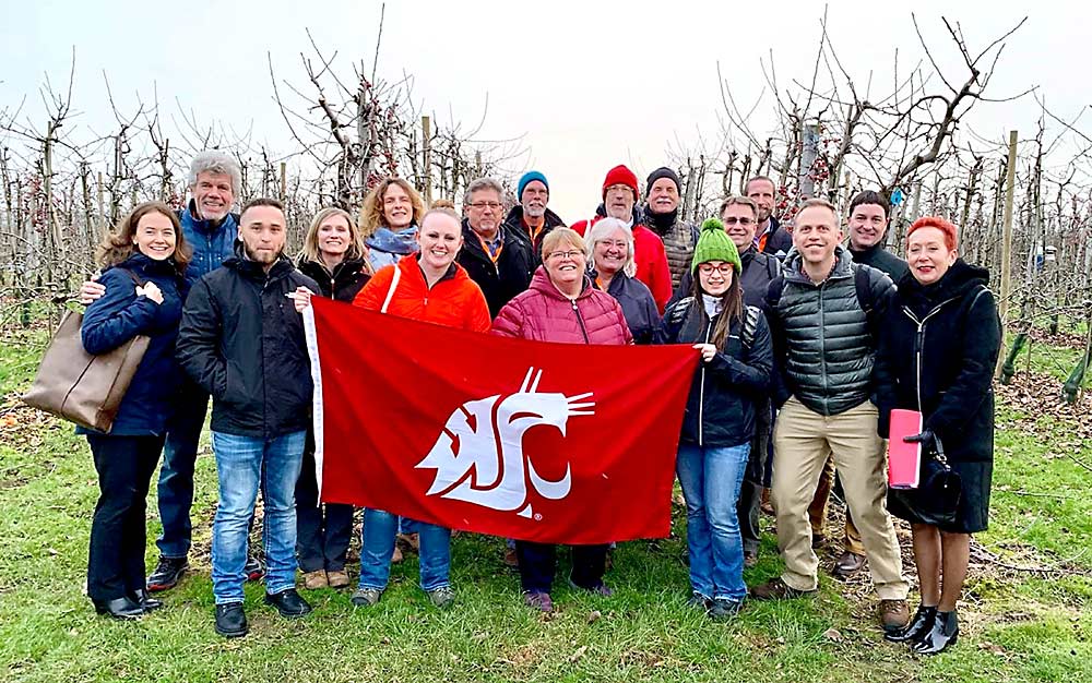 A delegation led by the Washington Tree Fruit Research Commission visits the Wageningen Research Center, Proeftuin Randwijk orchard on Feb. 6, 2019, in Wageningen, Netherlands. The trip was one step that led to the signing of an orchard technology collaboration agreement between the Netherlands and Washington state on Feb. 3. (Courtesy Washington Tree Fruit Research Commission)