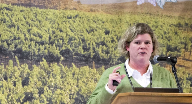 Inga Zasada, USDA scientist, shares her latest research results during the 2014 Washington Association of Wine Grape Growers convention held in Kennewick, Washington on Feb. 5, 2014. (TJ Mullinax/Good Fruit Grower)