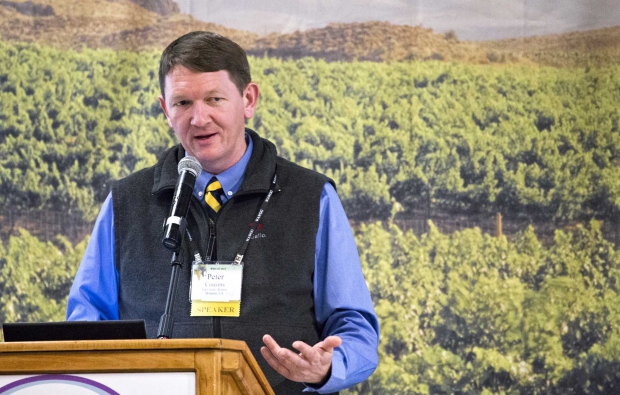 Peter Cousins shares the names of potential nematode-resistant rootstocks that may work for Washington grape growers during the 2014 Washington Association of Wine Grape Growers convention. (TJ Mullinax/Good Fruit Grower)