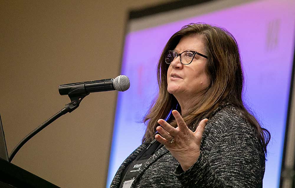 Kristina Kelley, executive director of the Washington State Wine Commission, shares the pillars of the industry’s new five-year strategic plan during a state-of-the-industry session Feb. 6 at WineVit, the annual convention organized by the Washington Winegrowers Association. “Washington wine on every table” is the vision, she said, which means making wine for everybody and every occasion. (TJ Mullinax/Good Fruit Grower)