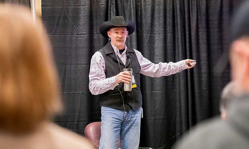 Christopher Sutherland, a pesticide compliance investigator with the Washington State Department of Agriculture, talks to attendees at a wine grape industry conference in February. It’s important to pay attention to paraquat label changes, he said: “It’s the only herbicide that I’m aware of that kills you the first time if you misuse it.” (TJ Mullinax/Good Fruit Grower)