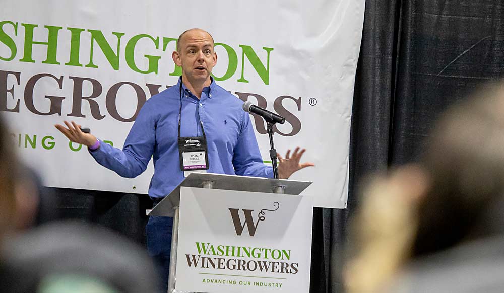 Adam Schulz, owner of Incredible Bulk Wine Co., speaks to 2022 WineVit attendees about supply and demand for Washington wine grapes. (TJ Mullinax/Good Fruit Grower)