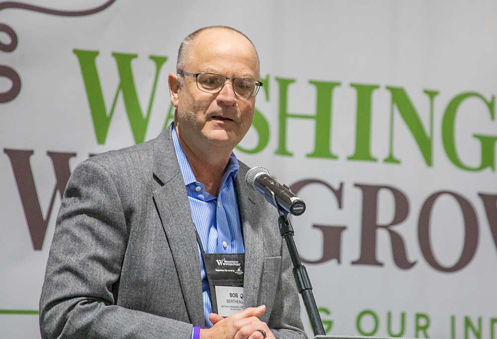 Bob Bertheau, senior director of winemaking at Ste. Michelle Wine Estates, receives the Grand Vin award during the 2022 WineVit convention and trade show on Feb. 10. (TJ Mullinax/Good Fruit Grower)