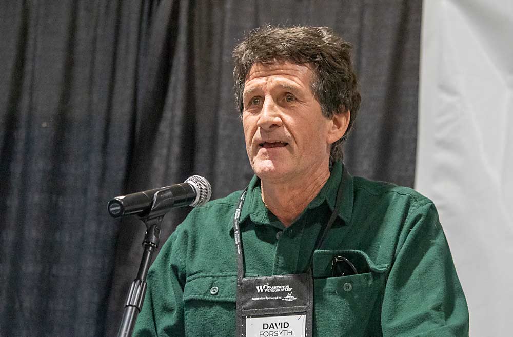 David Forsyth, winemaker for Four Feathers Wine Estates of Prosser, receives the Industry Service award during the 2022 WineVit convention and trade show for the Washington Winegrowers Association. (TJ Mullinax/Good Fruit Grower)