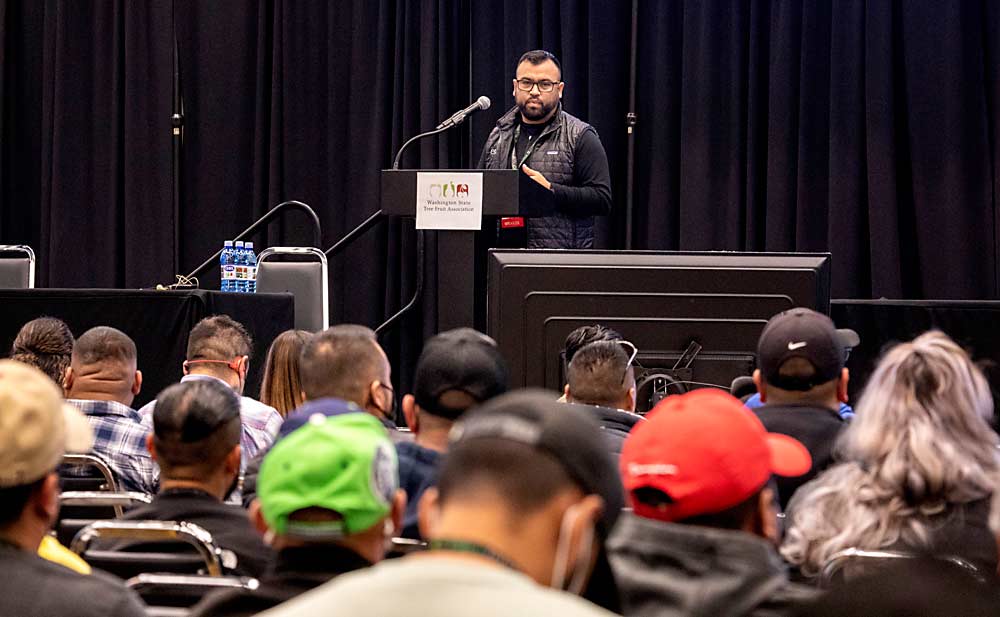 Daniel Valdovinos, Enzafruit Products, talks about specific techniques to successfully grow Envy (Scilate) during the Spanish sessions held at the 2021 Washington State Tree Fruit Association Annual Meeting in Yakima. (TJ Mullinax/Good Fruit Grower)