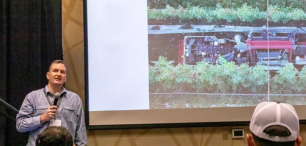 Curt Salisbury speaks about what Abundant Robotics learned in their effort to create an autonomous apple harvester during the second day of the Washington State Tree Fruit Association's Annual Meeting on Tuesday, Dec. 7, 2021, at the Yakima Convention Center in Yakima, Washington. (TJ Mullinax/Good Fruit Grower)