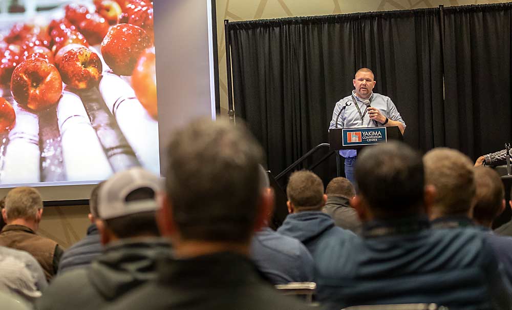 Kevin Brandt of Proprietary Variety Management wraps up a presentation about Cosmic Crisp market performance in December at the Washington State Tree Fruit Association Annual Meeting in Yakima, Washington. (TJ Mullinax/Good Fruit Grower)