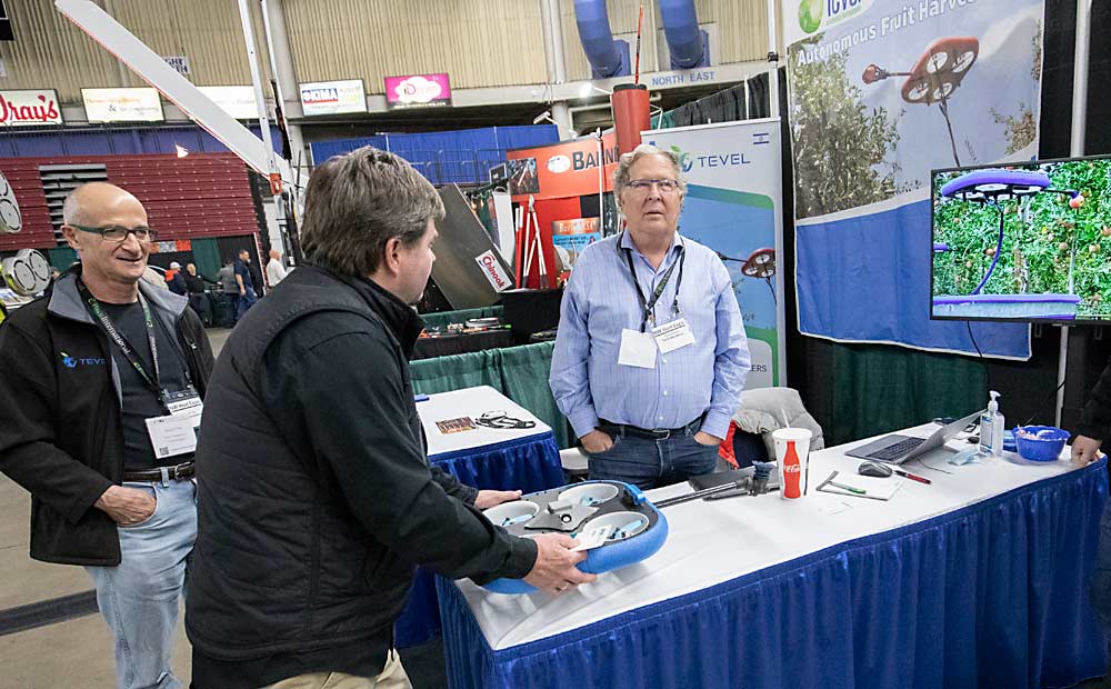Ever seen a drone pick an apple? The first day of the Washington State Tree Fruit Association's NW Hort Expo has you covered at the Yakima Valley SunDome in Yakima, Washington, on Monday, December 6, 2021. (TJ Mullinax/Good Fruit Grower)