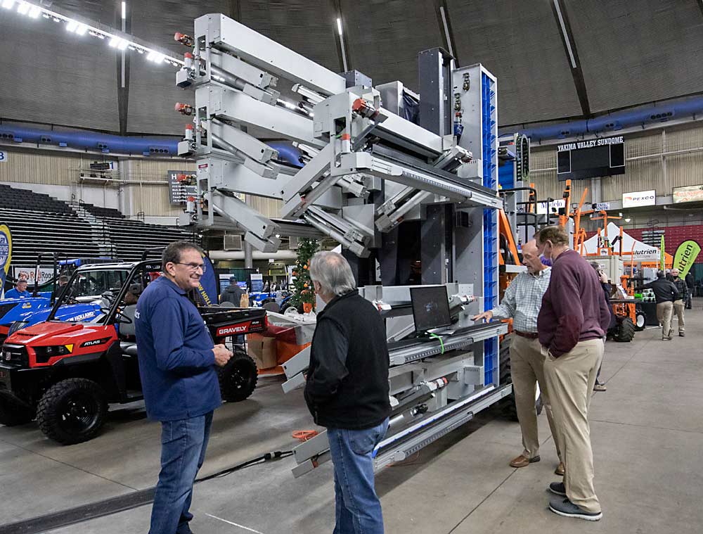 Fresh Fruit Robotic Harvester is on display on the first day of the Washington State Tree Fruit Association's NW Hort Expo on Monday, December 6, 2021 at the Yakima Valley SunDome in Yakima, Washington. (TJ Mullinax/Good Fruit Grower)