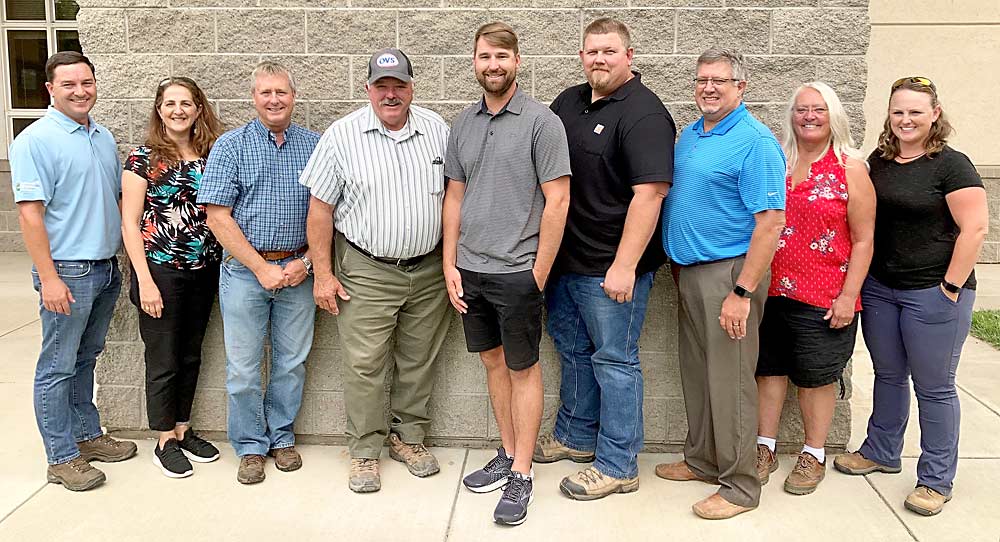 Washington Tree Fruit Research Commission board members pose for a picture in August. From left to right: Jeff Cleveringa, Luisa Castro, Brent Milne, chair Jim Doornink, Craig Harris, Keith Veselka, Sam Godwin, Dena Ybarra and Teah Smith. Matt Miles not pictured. (Courtesy Washington Tree Fruit Research Commission)